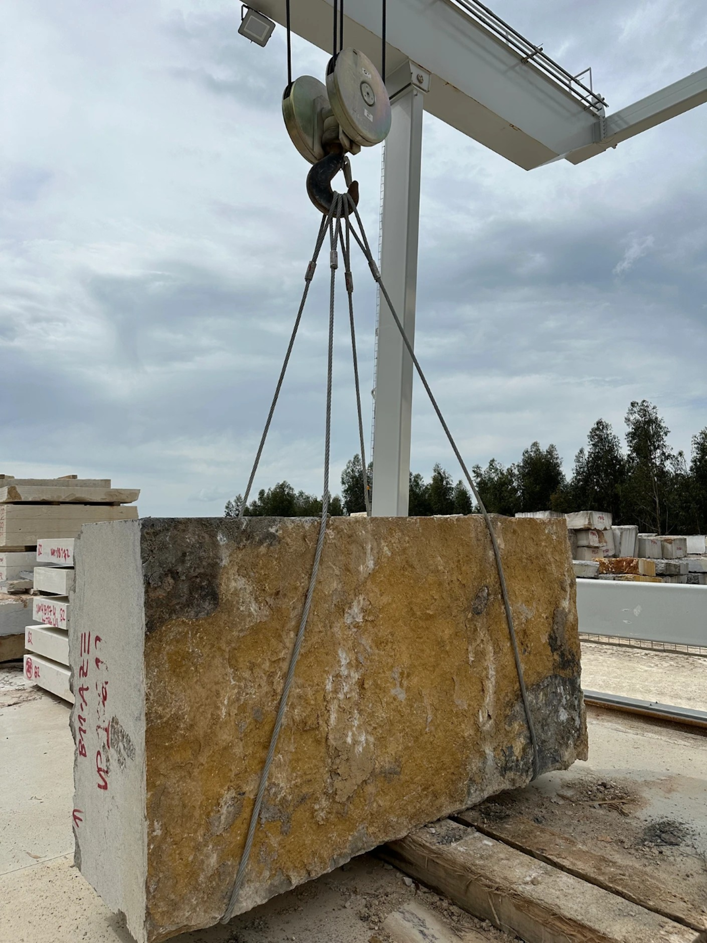 Stone being removed from quarry to be finished.